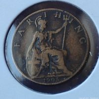 Obverse side of 1905 English farthing coin showing Britannia seated with trident and shield, inscription 'FARTHING' and date '1905'.