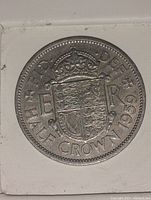 Close-up of the shield and crown with the inscription including the year 1959 and denomination Half Crown.