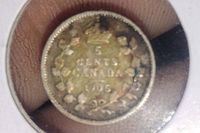 Close-up of the coin reverse showing denomination, year, crown and wreath details.