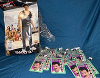 Original packaged Pauly D muscle suit costume from Jersey Shore with packaging showing image of costume worn.
