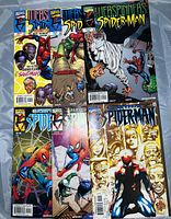 Set of six Spider-Man WebSpinners comic books, issues 7 through 12, with vibrant cover illustrations showing Spider-Man and other characters.