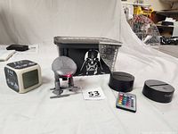 Full lot showing Star Wars climbing robot, 3D illusion light base with acrylic plate and remote, Darth Vader alarm clock, and Star Wars treasure container with Darth Vader graphic.