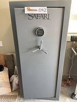 Front view showing Safari by Cannon logo, digital keypad, chrome three-spoke handle