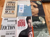 Lot of 6 paperback books arranged showing front covers with titles and authors visible.