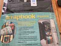 Photo of front label on scrapbook organizer packaging showing product name and pictures of organizer uses.