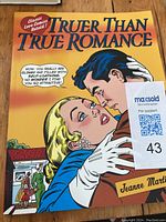 Front cover of 'Truer Than True Romance' comic book showing romantic couple and title.