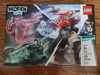 Front of the LEGO Hidden Side 70421 box showing the El Fuego's Stunt Truck with ghostly effects graphic and LEGO branding.