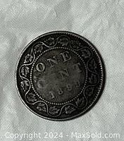 Reverse side of the 1899 Canada One Cent Large Penny showing denomination ONE CENT, year 1899, and decorative wreath.