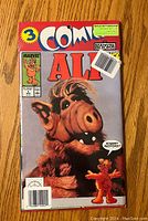 Photo of ALF Comics Issue #3 by Marvel Books, featuring ALF character on the cover with a speech bubble saying 'Robert Redford?'