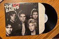 Front cover of The Babys vinyl record album showing band members