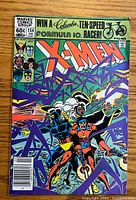 Front cover of The Uncanny X-Men comic book issue #154 featuring main characters and promotional text.