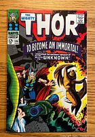 Front cover of Thor comic book issue #136 with full-color artwork and title text.