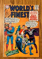 Front cover of World’s Finest #155 comic book showing colorful characters Superman, Batman, Robin and Nightman. Includes text and price of 12 cents.