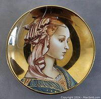 Front view showing detailed portrait of Madonna in Renaissance style with gold accents.