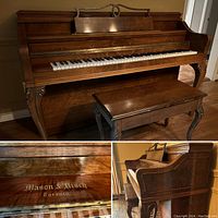 Full view of the upright Mason & Risch piano with matching bench in front, showing polished wood finish and carved decorative elements.