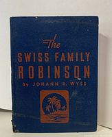 Front cover of the book with blue cloth and orange lettering, title and author visible.