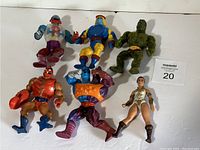 Overview photo of six vintage Masters of the Universe action figures arranged on a white background