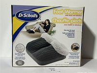 Box of Dr.Scholls Foot Warmer with Heat and Vibration shown from front, displaying product image, brand and features.