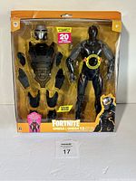 Front view of Fortnite Omega action figure and 13-piece armor set in packaging.