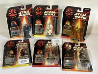 Six Star Wars Episode 1 Hasbro action figures in original packaging, arranged in two rows of three.