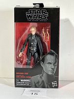 Front view of Star Wars The Black Series Dryden Vos figure in sealed packaging, showing figure, accessories, and branding.