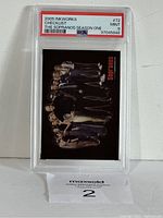 Front view of the graded trading card showing the cast image and grading label.