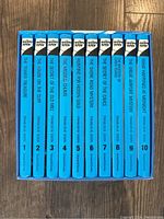 Spine view of all 10 Hardy Boys books in blue covers, showing titles and volume numbers 1 to 10.