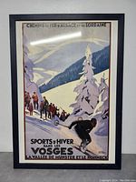 Framed vintage skiing poster in original frame showing a winter skiing scene in the Vosges mountains with various figures on a snowy slope.
