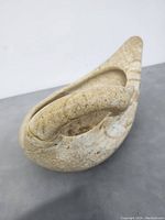 Top view of the soapstone carving showing curved head and hollowed body