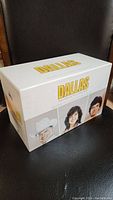 Box set titled 'Dallas The Complete TV Series DVD Collection' with images of characters on box.