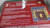 Packaging detail showing 5-foot length, 200-light count, indoor/outdoor use, and safety instructions.