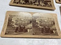 Close-up photo of the stereoview card showing 'The Pool in Bethesda' in Jerusalem with a group of people by the water