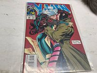Photo of X-Men comic book issue 24 showing cover featuring Rogue and Gambit.