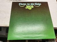 Front cover of 'Close to the Edge' LP album by Yes, green gradient background