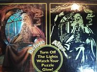 Box image showing the glow in the dark effect with before and after lighting off pictures of the wizard illustration.