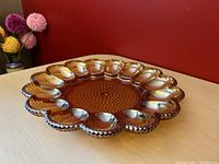 Side angled view showing hobnail texture and egg compartments