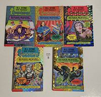 Five vintage Goosebumps Readers Choice books displayed front-facing showing colorful horror-themed covers by R.L. Stine.