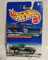 Front view of Hot Wheels 1957 T-Bird Treasure Hunt car sealed in original blister pack with visible model and branding details
