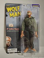 Front view of Mego Wolfman action figure in unopened blister card packaging showing figure details and branding.
