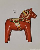 Front view of large vintage hand-painted Swedish Dala horse wooden figurine showing detailed paintwork and folk art style.