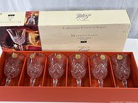 Set of six Cristal d’Arques Masquerade wine glasses displayed in original box with sticker labels on each glass