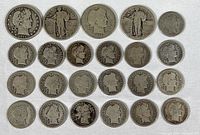 Overview of all silver dimes and quarters arranged on fabric background.