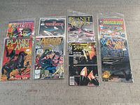 Overview of all 8 comic books individually bagged with backing boards, showing front covers with titles: Ape City, Terminator, Youngblood, Avengers West Coast, Samurai, and three Planet of the Apes issues.