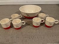 Set of 6 cups and one large bowl with Tom & Jerry script in cream & red color