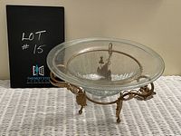 Front angle view of the glass bowl in the metal holder showing the crackle spackled texture and metal leaf and grape motif.