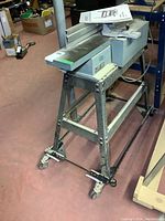 Front-left perspective of the Delta jointer mounted on its stand