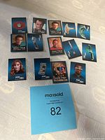 Set of 12 assorted Star Trek Fritos mini collectible cards laid out on a surface, showing various characters and objects related to Star Trek series.
