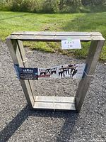 Full view of steel V style furniture leg, showing shape and finish.