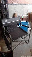 Coleman camping chair close-up with side table in folded down position