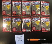Front view of all 10 unopened 1991 Soccer Shots foil wax packs arranged in two rows of five, showing logos, title, and promotional Pelé card info.